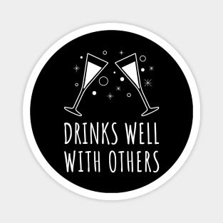 Drinks well with others Magnet